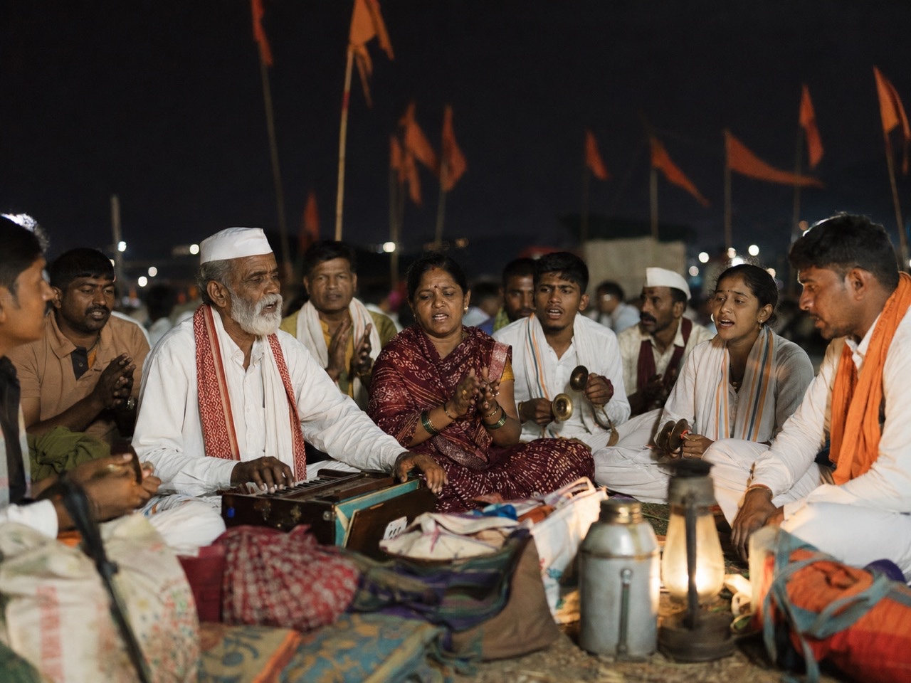 Warkari Devotees Singing Bhajans at Night Camp | Royalty-Free image | Pixlaris