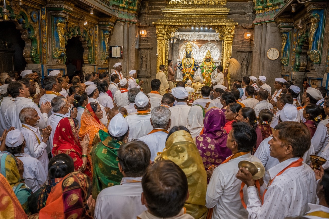 Devotees Offering Prayers Inside Vitthal Rukmini Temple | Royalty-Free image | Pixlaris