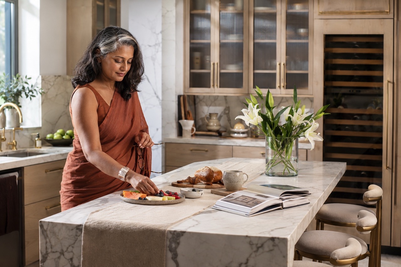 Elegant Indian Woman Preparing Breakfast in Luxury Modern Kitchen | Royalty-Free image | Pixlaris