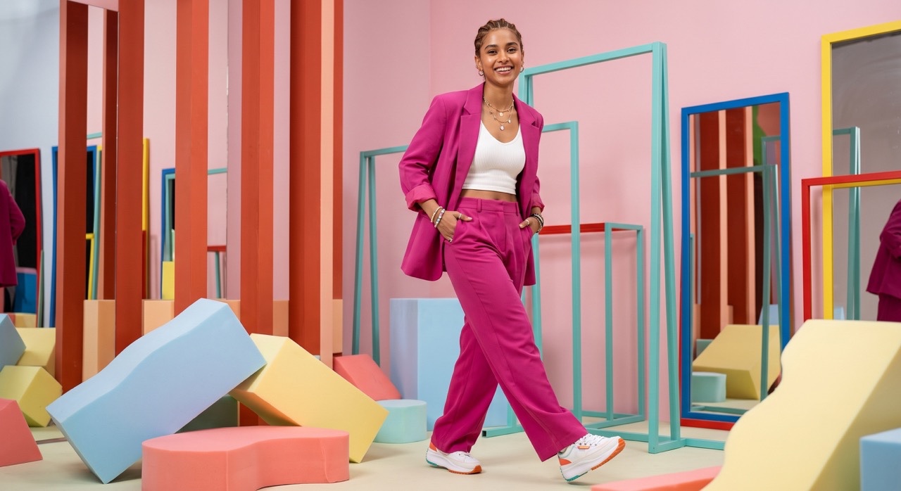 Confident Walk in Bright Pink Fashion Suit | Royalty-Free image | Pixlaris