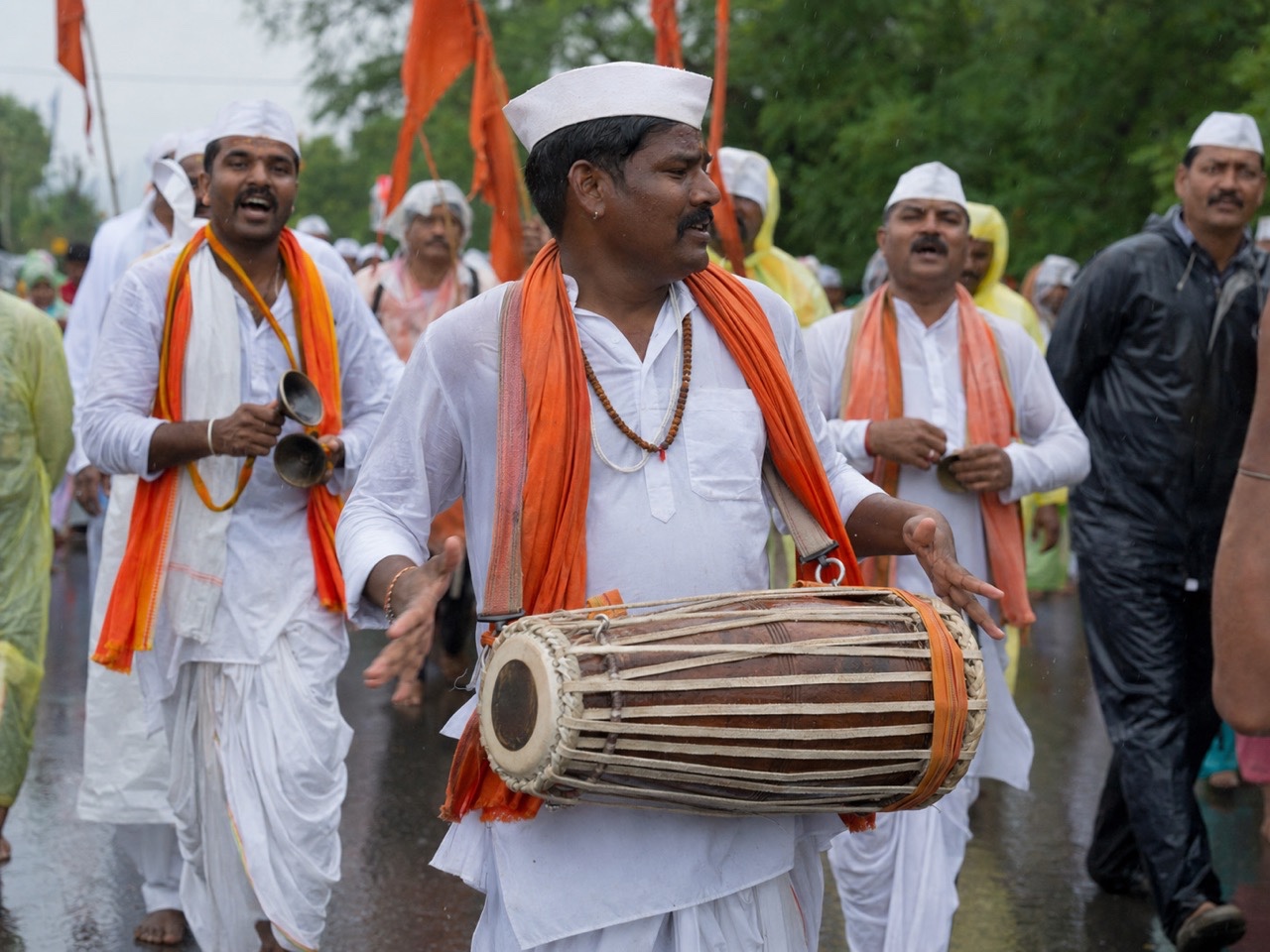 Close View of Varkari Drummer in Ashadhi Wari Procession | Royalty-Free image | Pixlaris