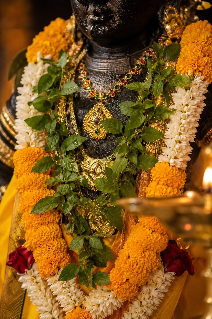 Close Up Detail of Lord Vitthal Floral Garland and Jewellery | Royalty-Free image | Pixlaris