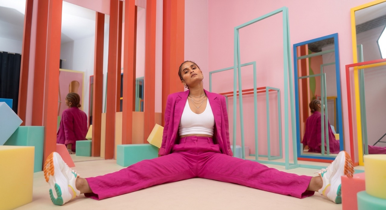 Relaxed Fashion Pose in Contemporary Color Studio | Royalty-Free image | Pixlaris